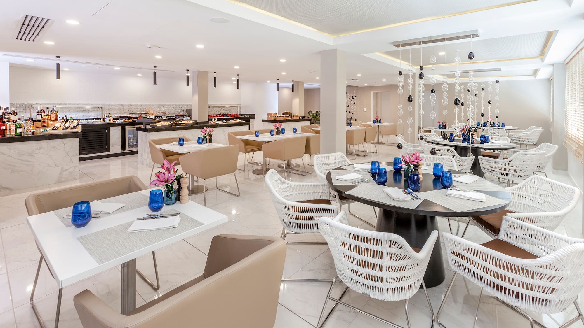 a restaurant with tables and chairs