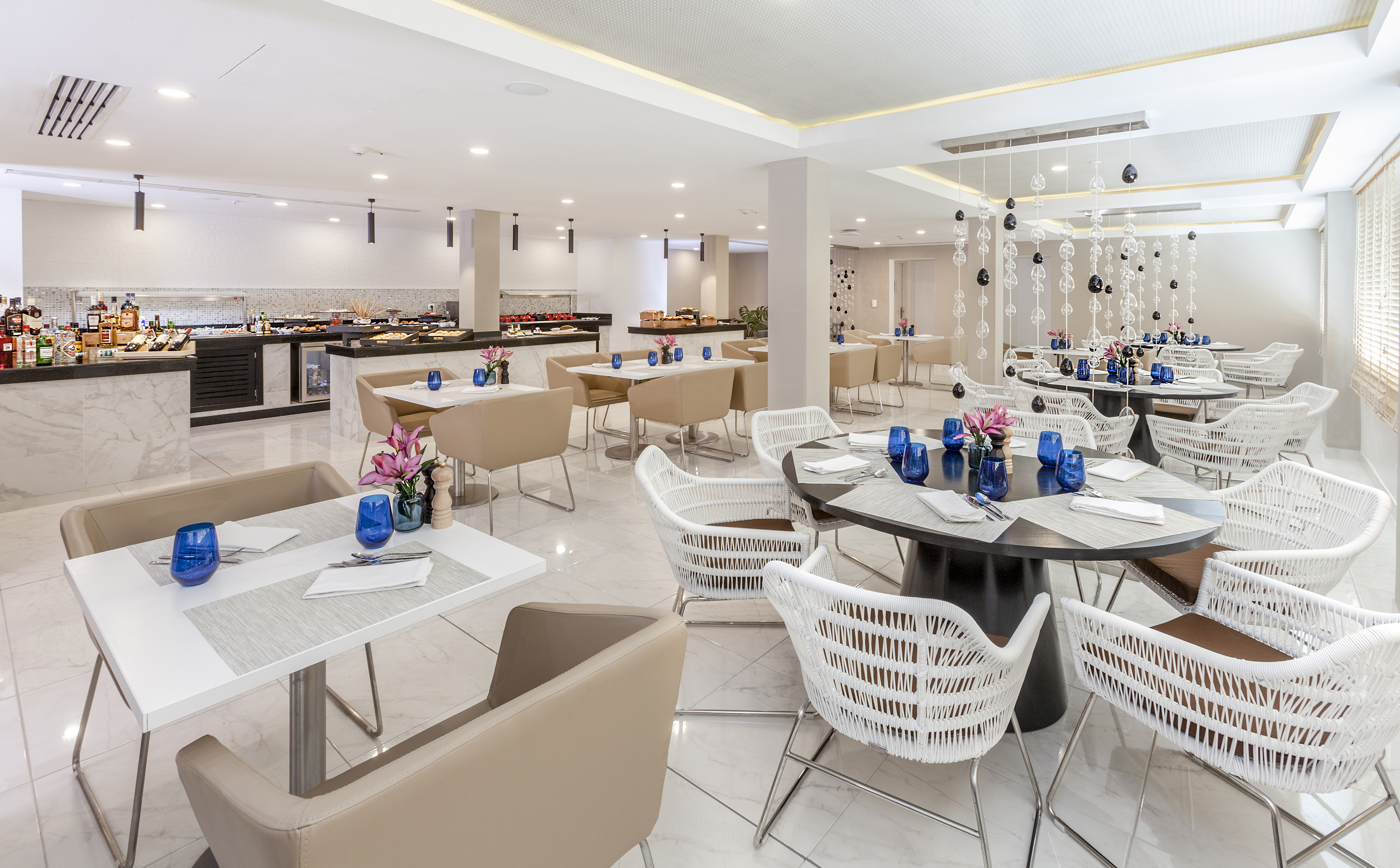 a restaurant with tables and chairs