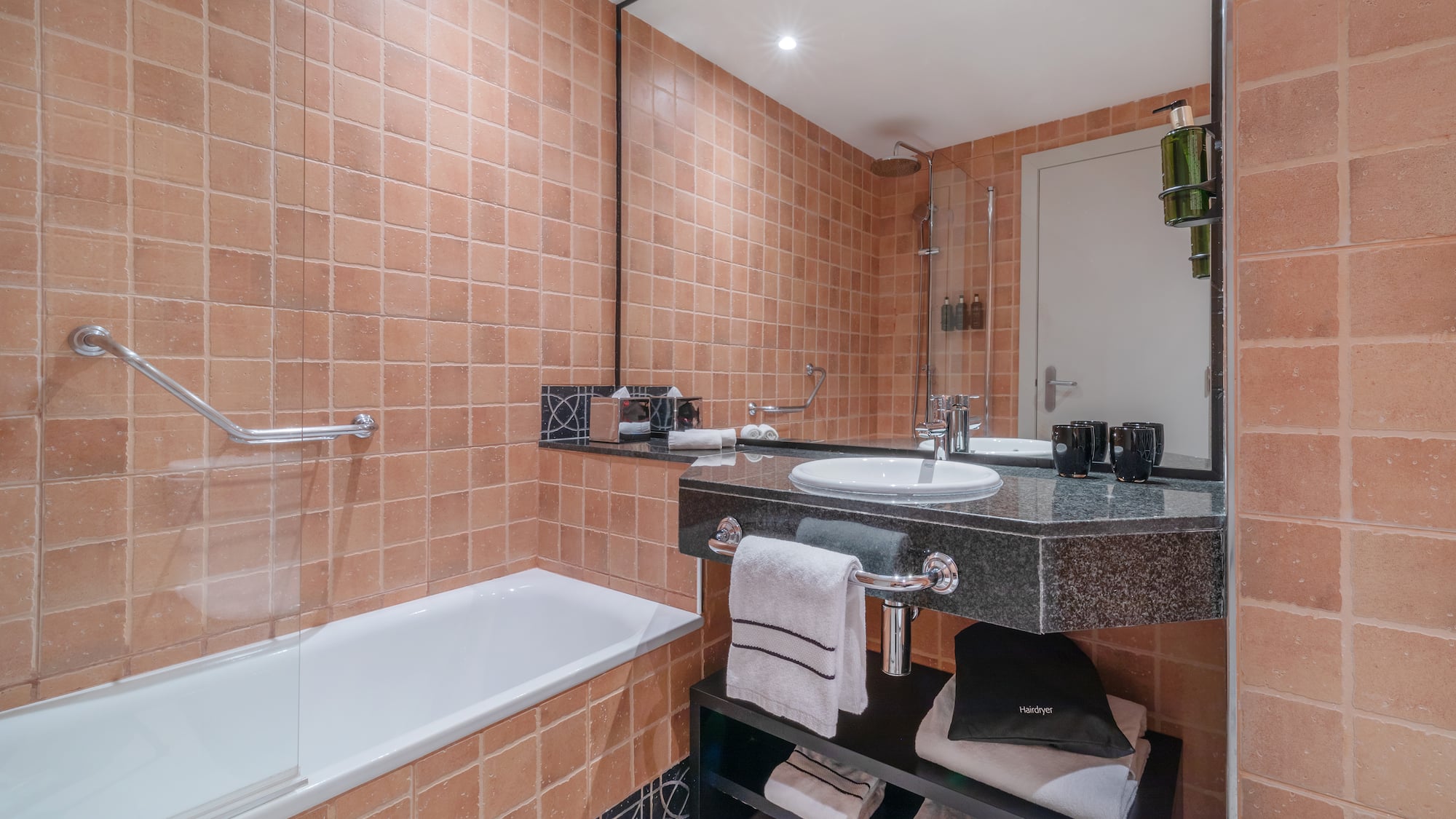 a bathroom with a sink and bathtub
