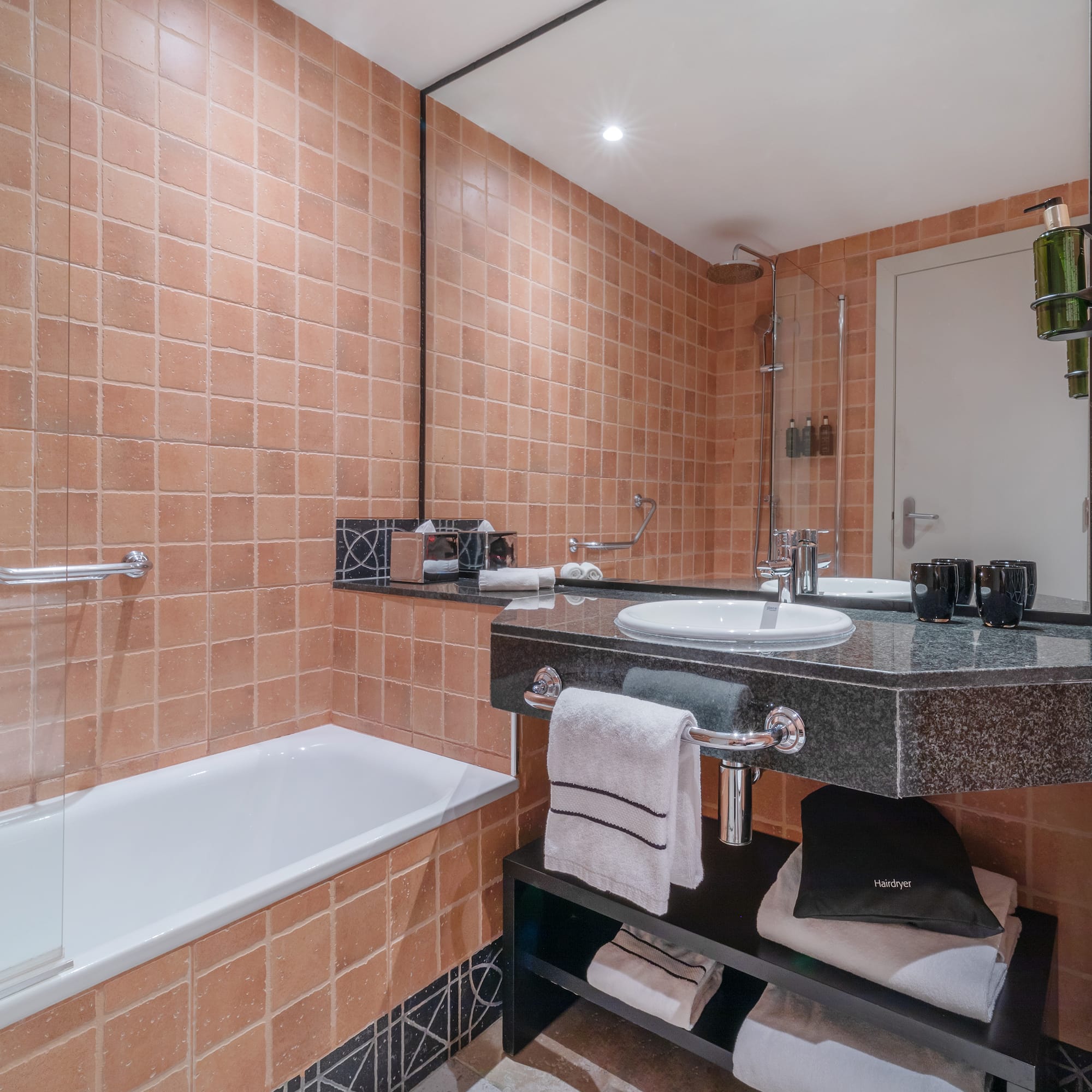 a bathroom with a sink and bathtub