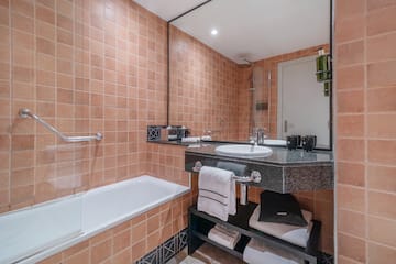 a bathroom with a sink and bathtub