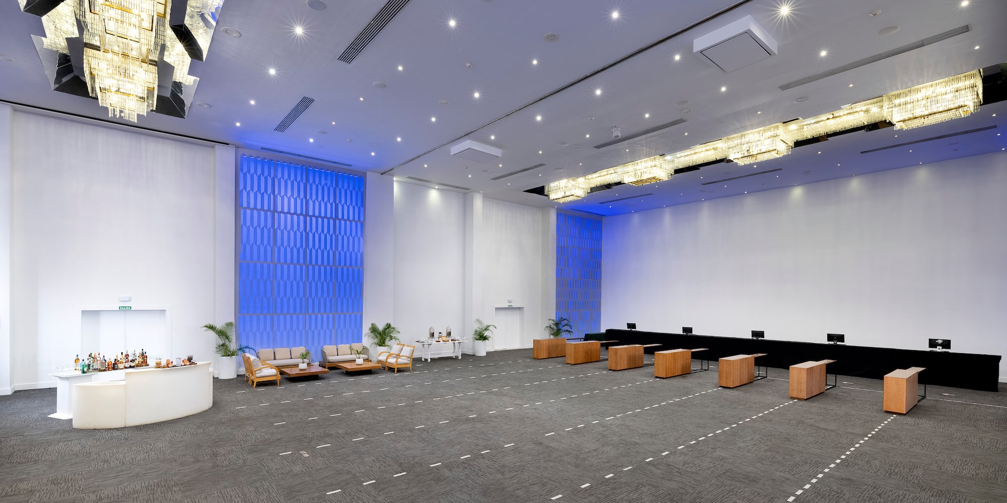 a room with a large window and a large wall