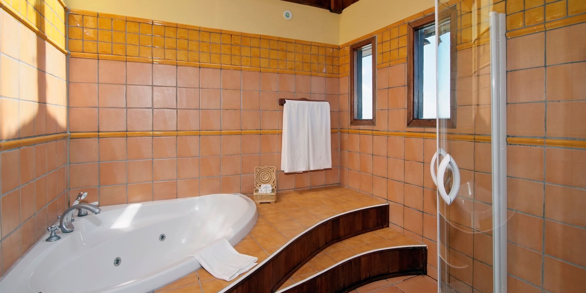 a bathroom with a bathtub and shower