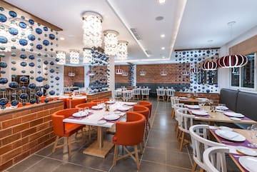 a room with tables and chairs