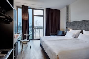a room with a bed and a desk