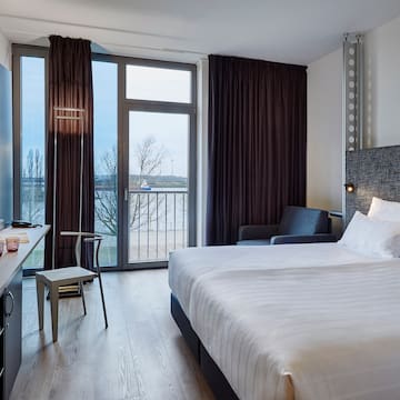 a room with a bed and a desk