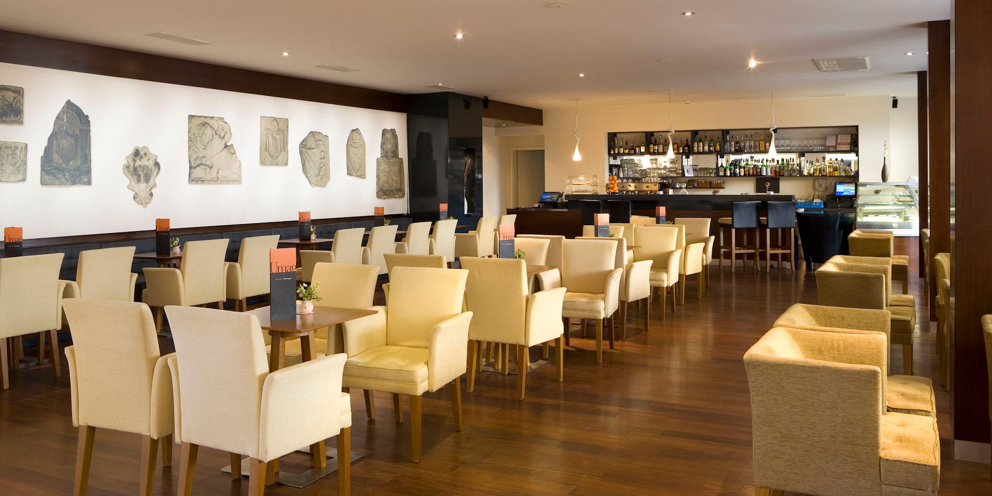 a room with tables and chairs