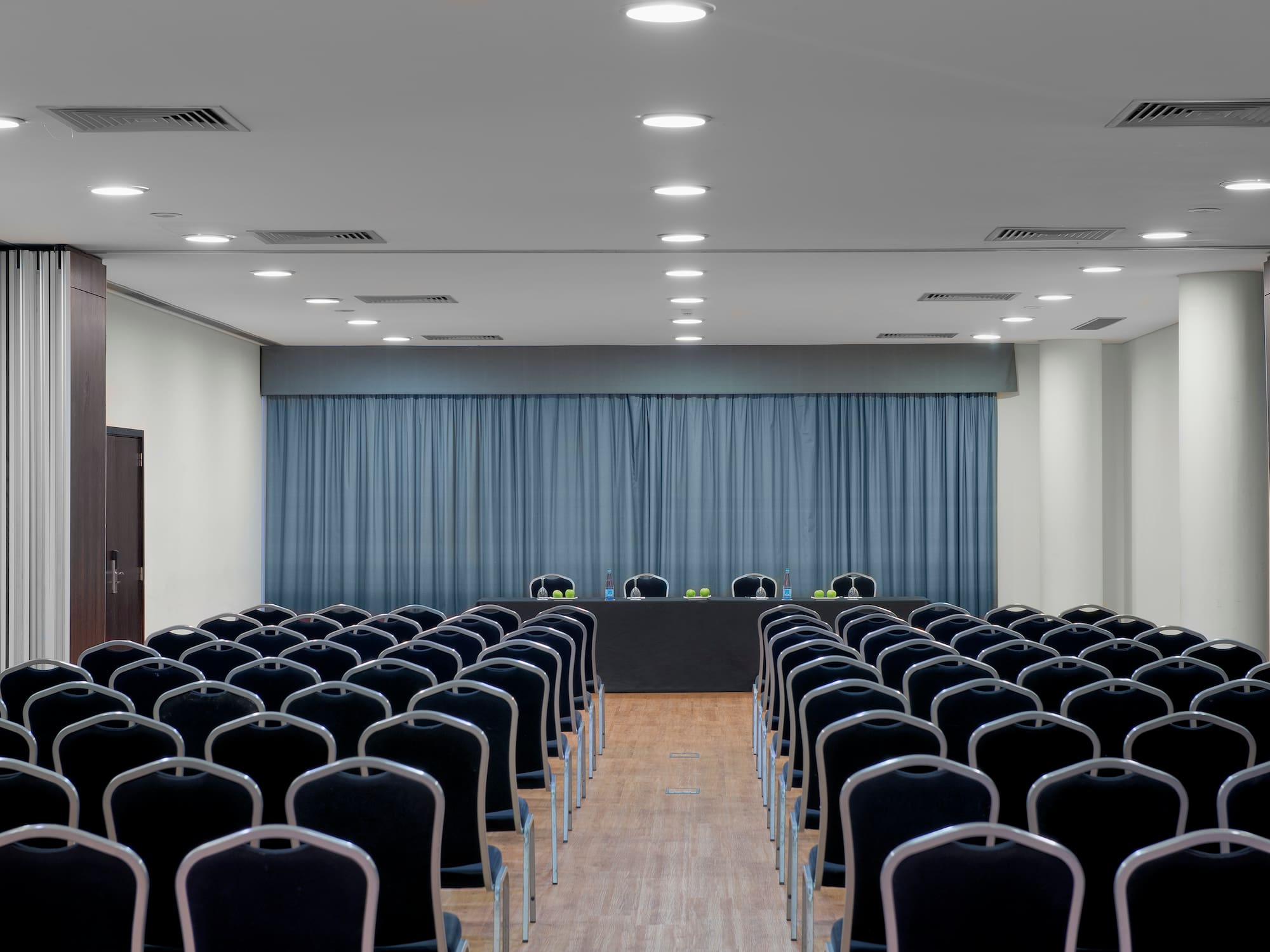 a room with chairs and a table