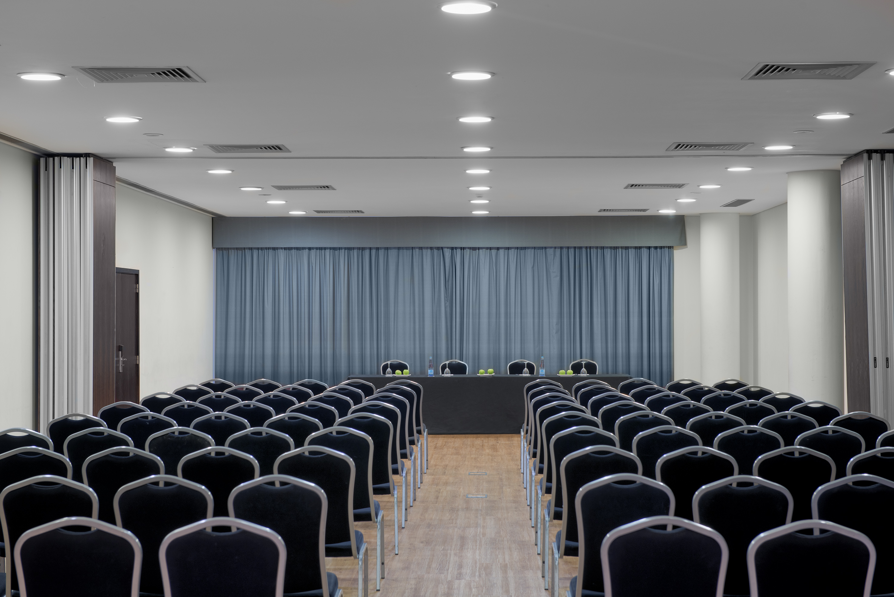 a room with chairs and a table