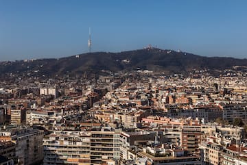 a city with a hill in the background