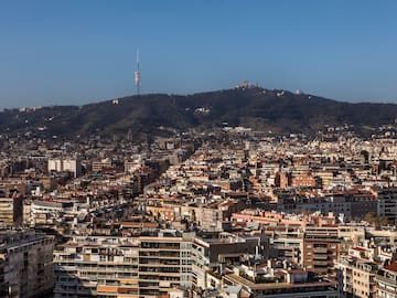 a city with a hill in the background