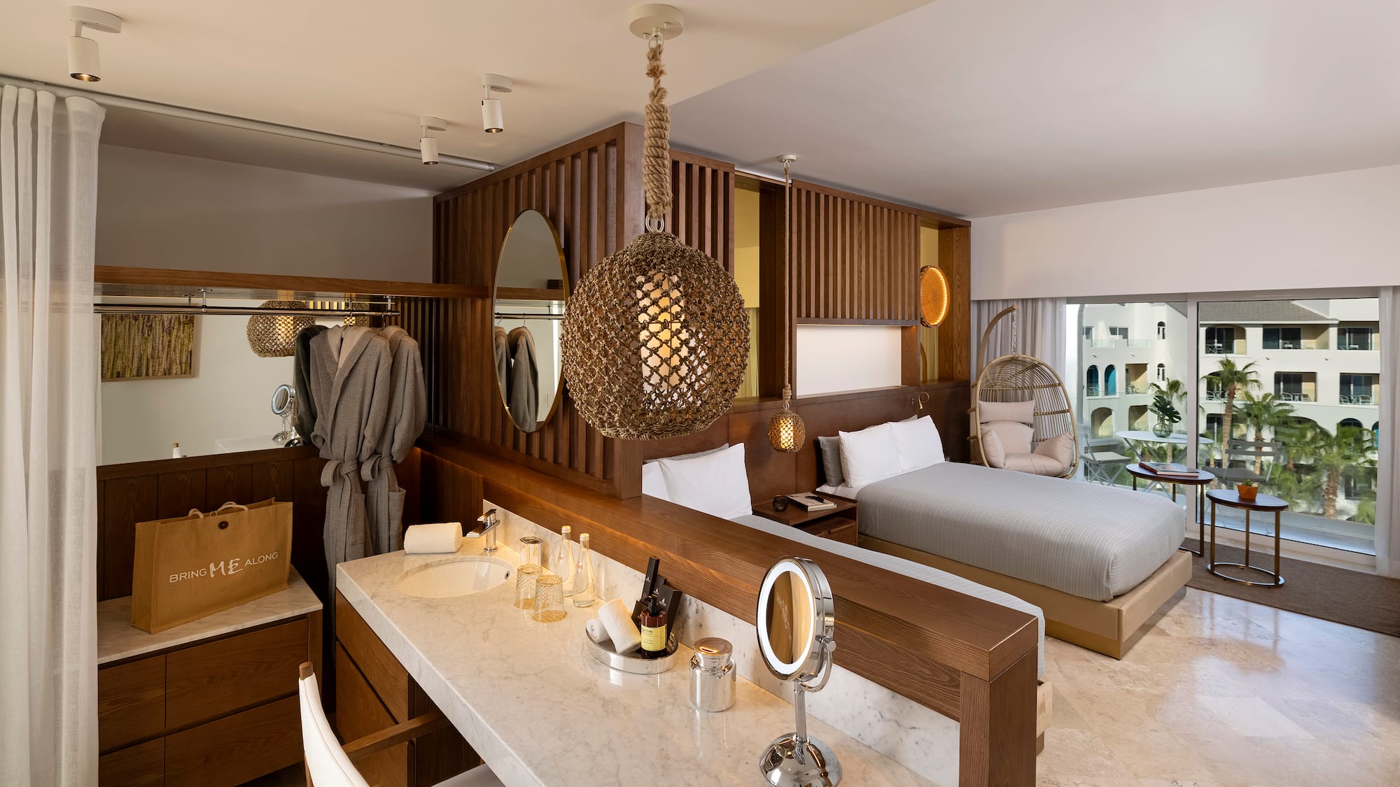 a room with a bed and a mirror