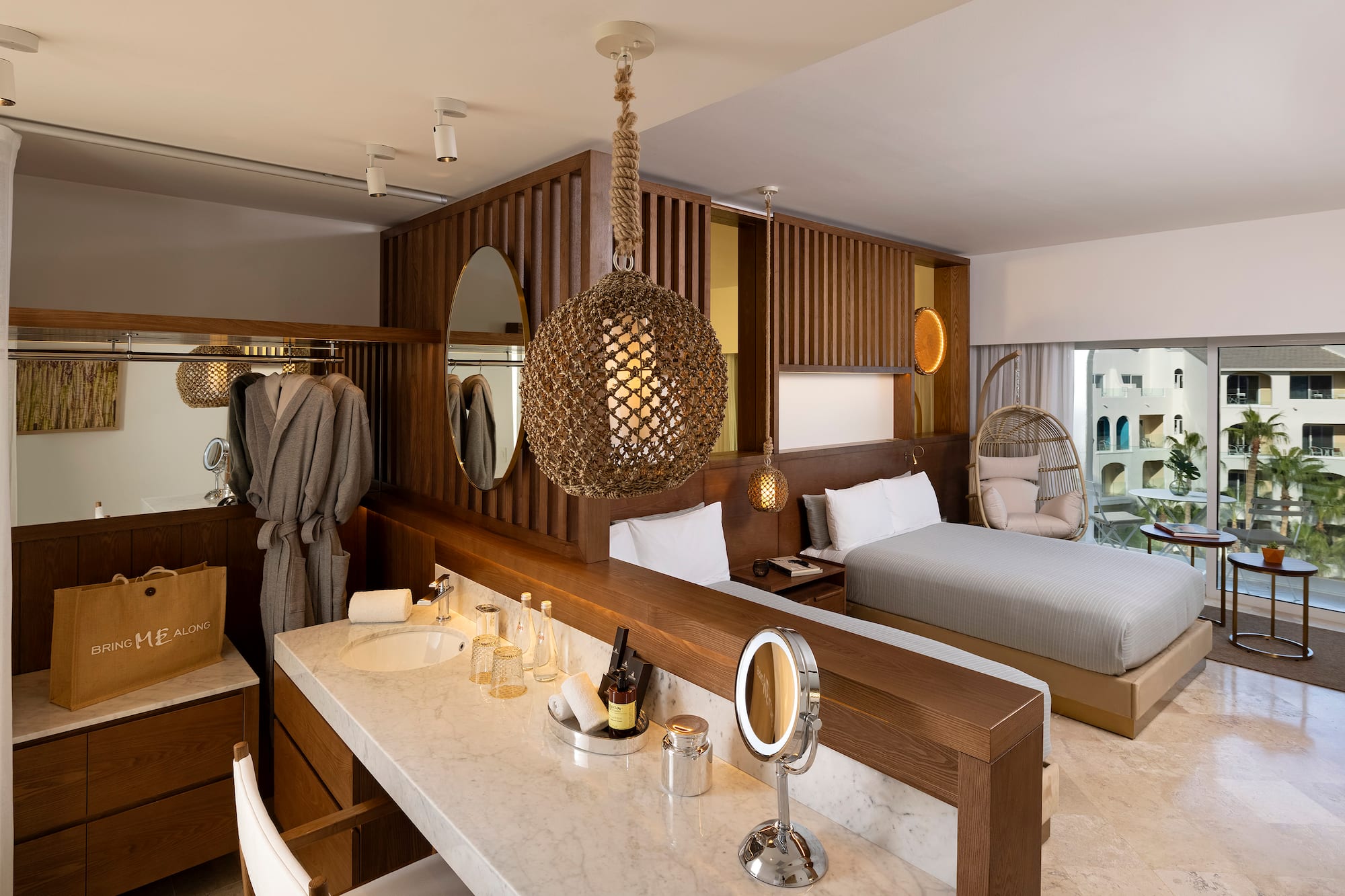 a room with a bed and a mirror