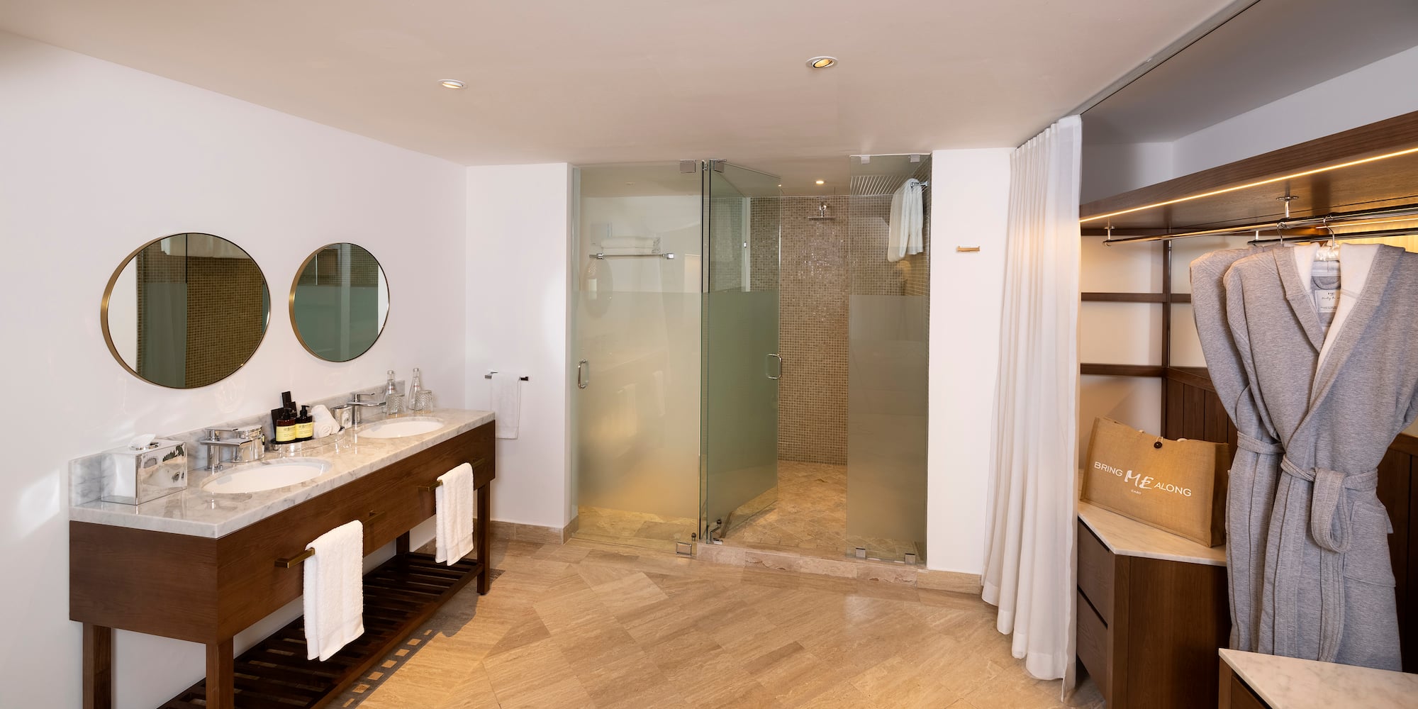 a bathroom with a shower and sink