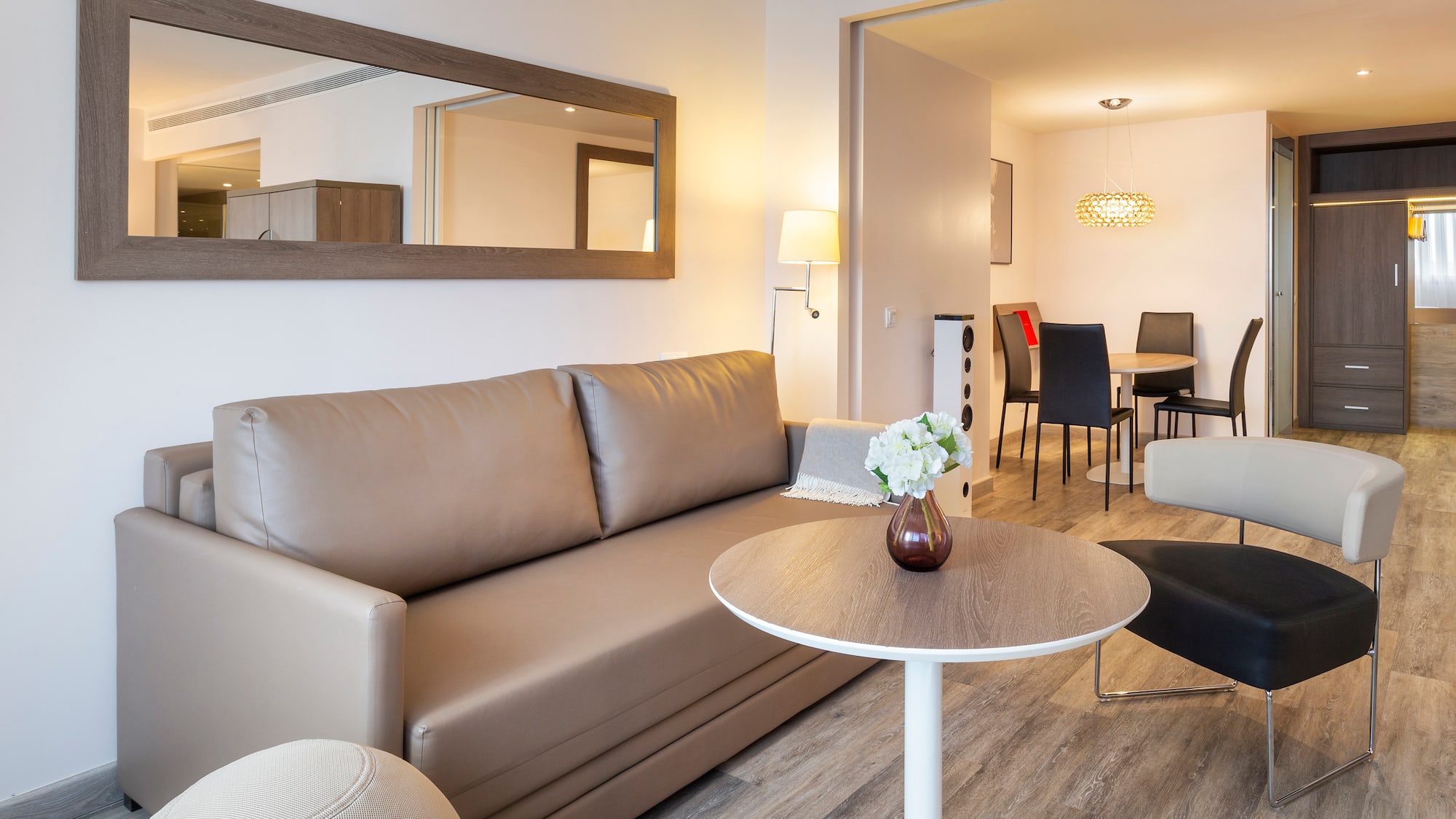 a living room with a couch and a table