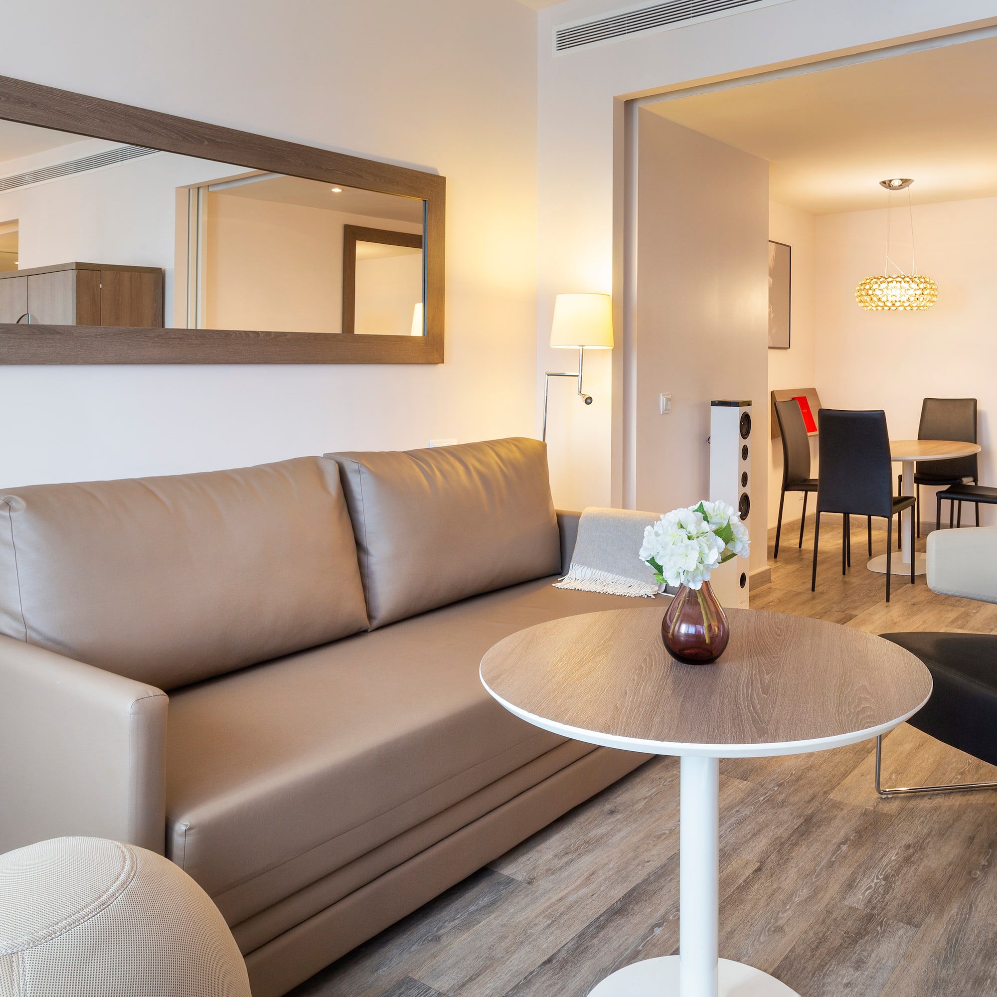 a living room with a couch and a table