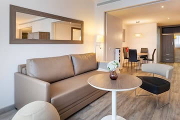 a living room with a couch and a table