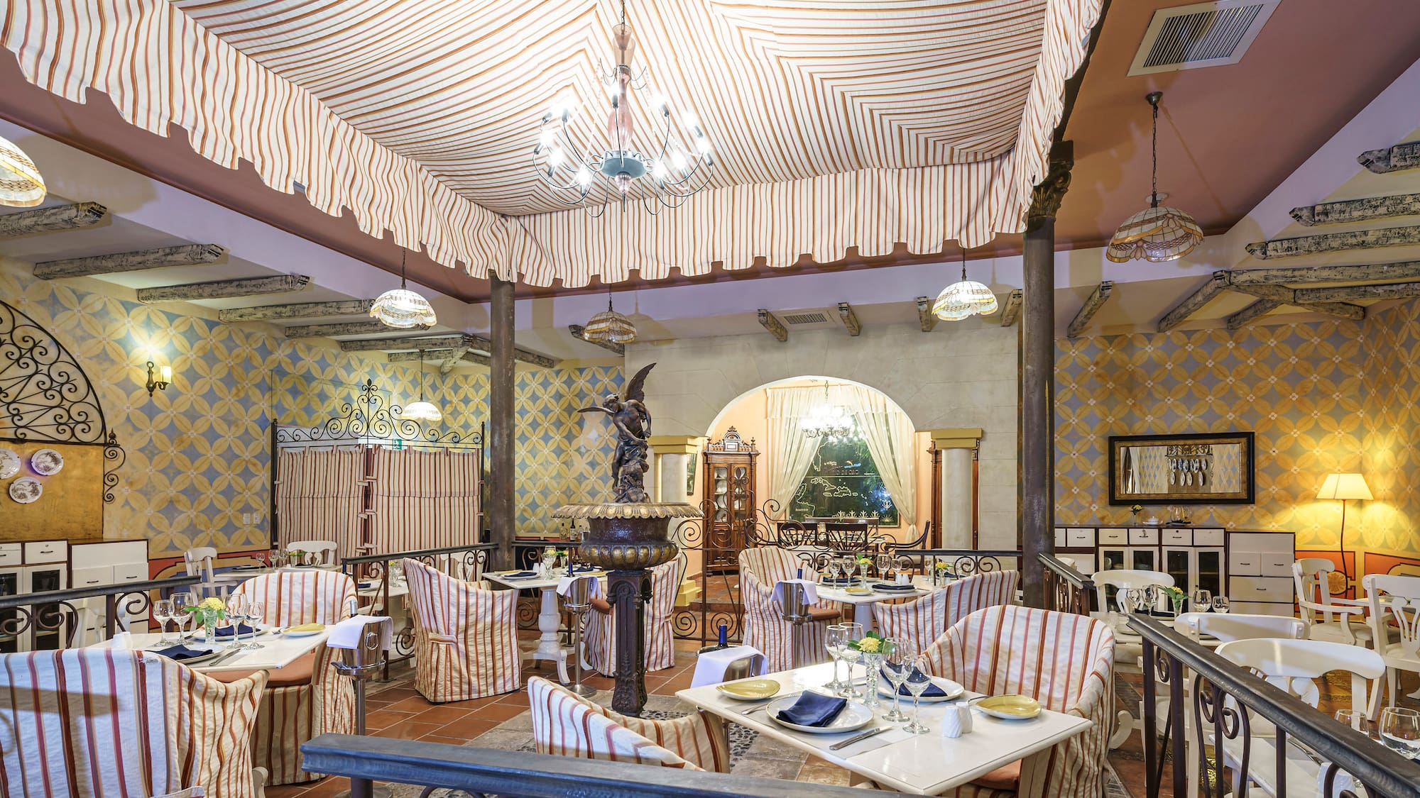 a restaurant with tables and chairs