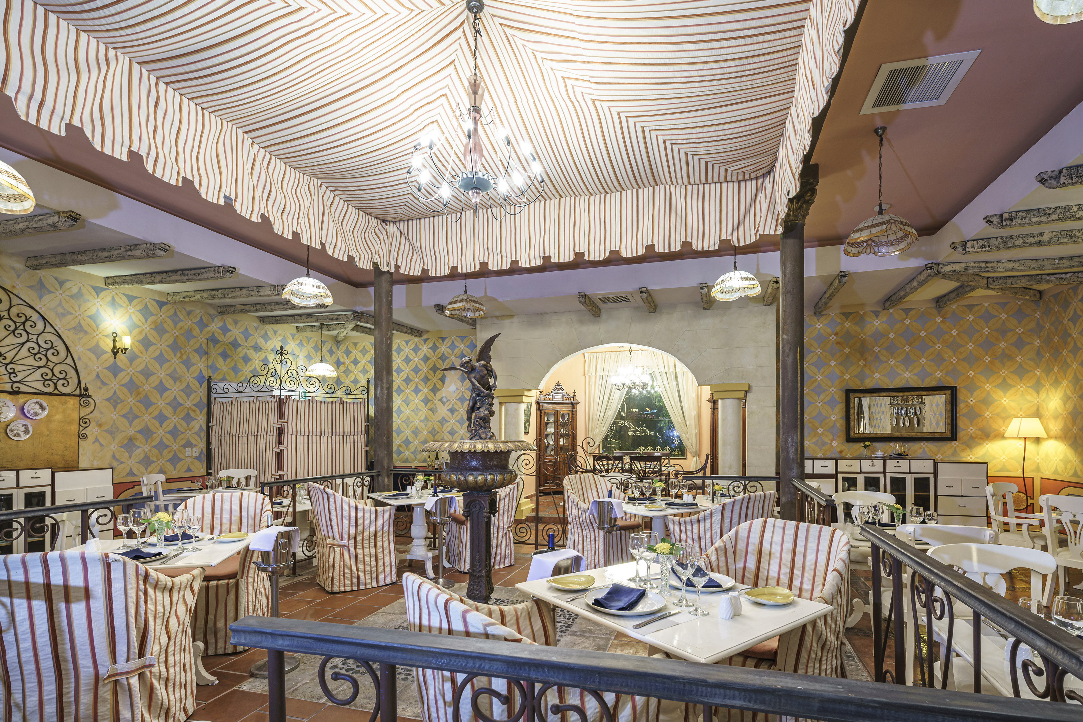 a restaurant with tables and chairs