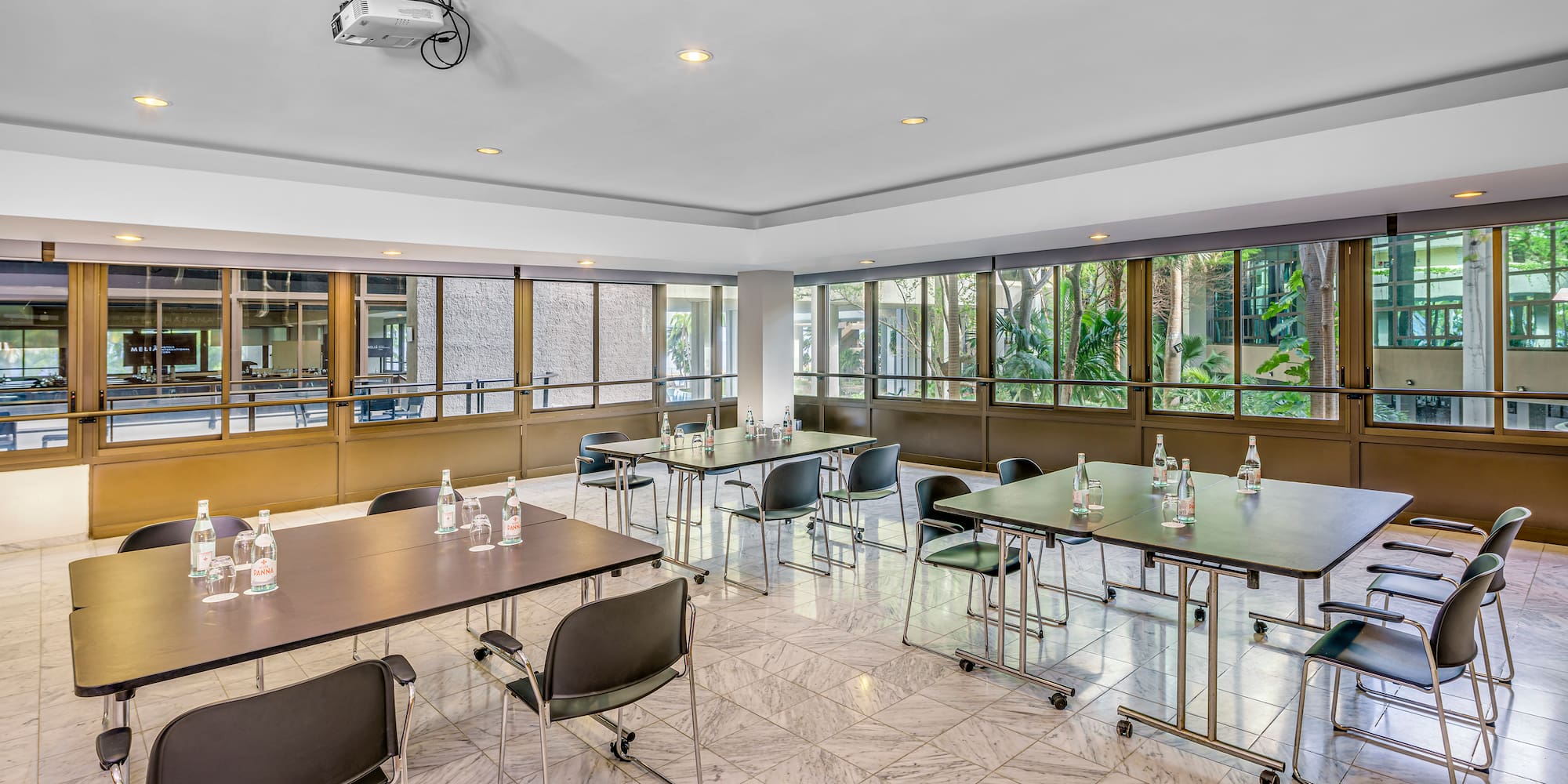 a room with tables and chairs