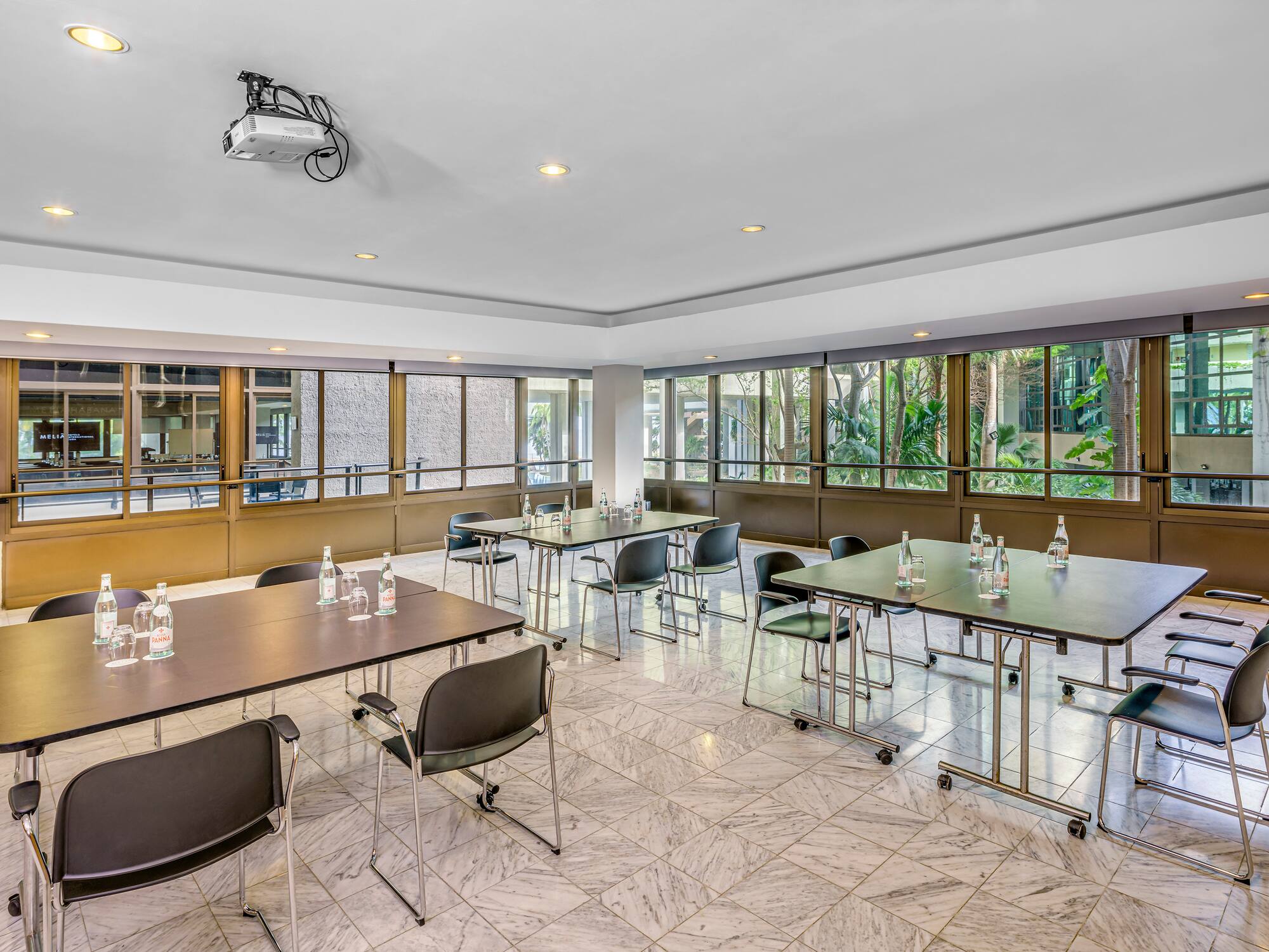 a room with tables and chairs