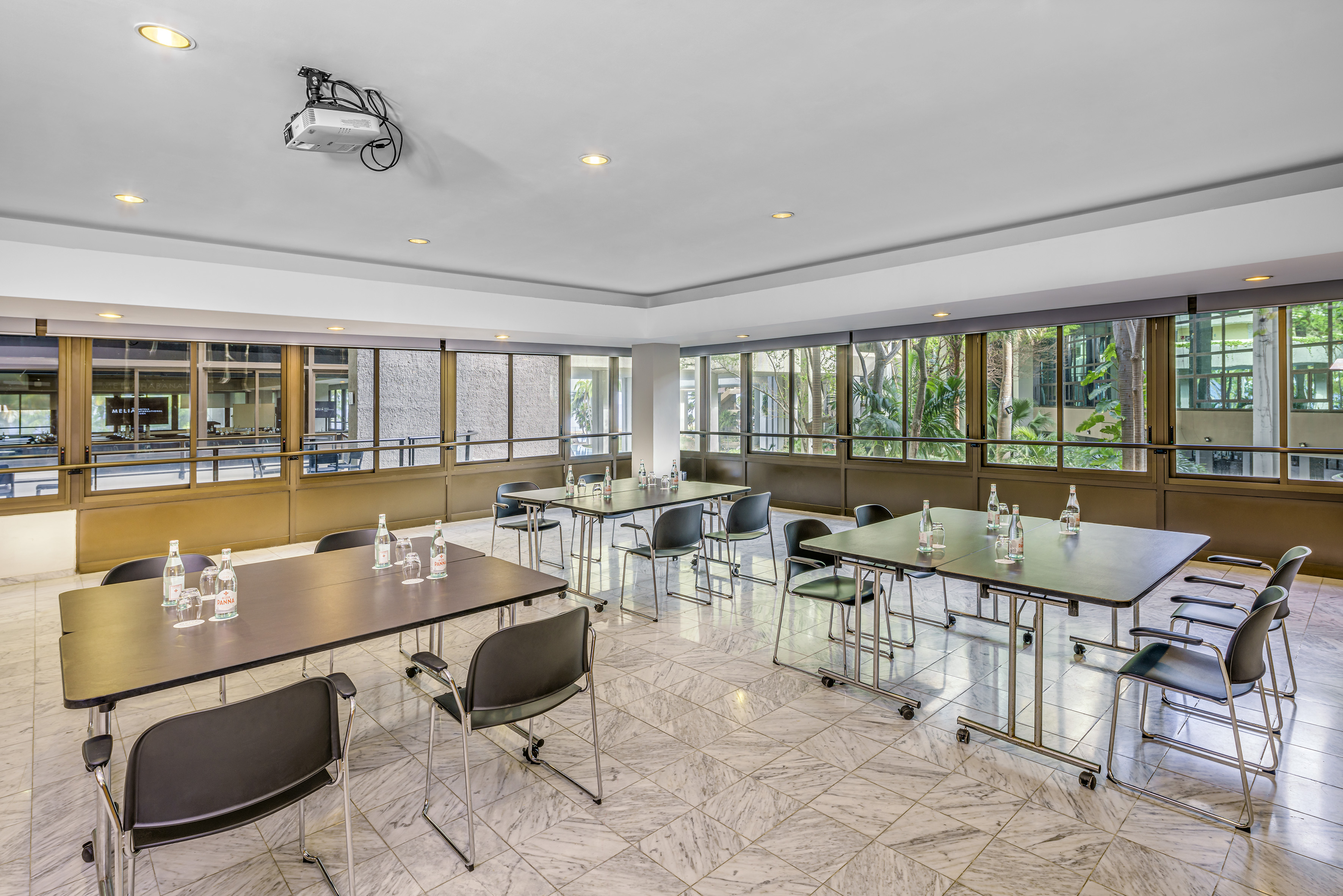 a room with tables and chairs