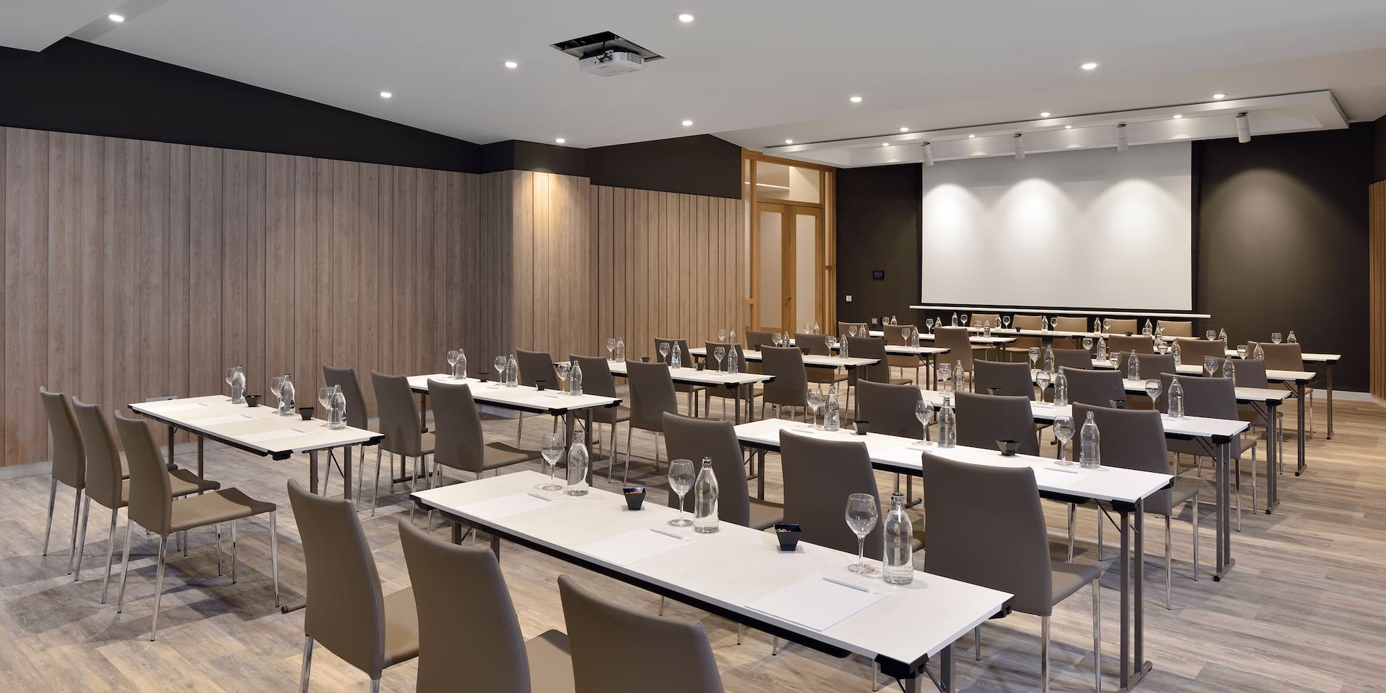 a room with tables and chairs