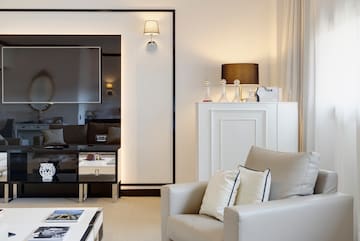 a living room with a tv and a couch