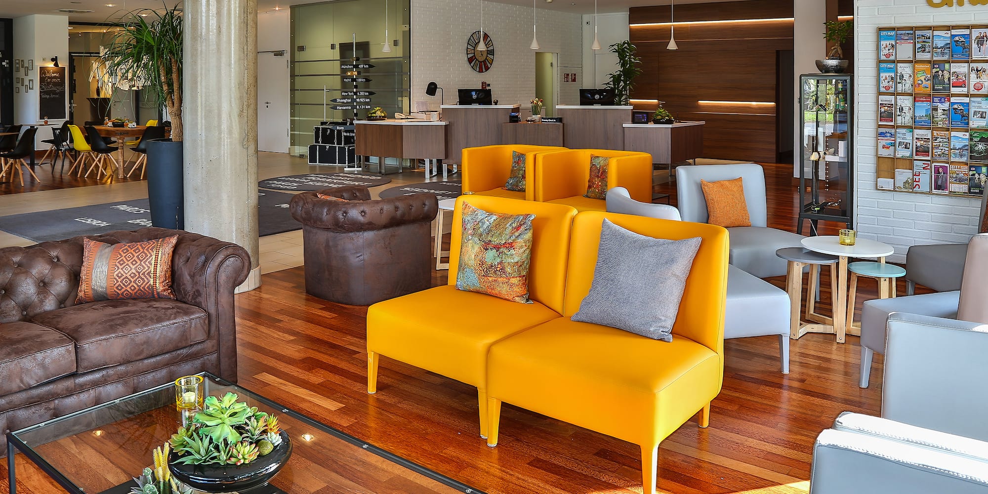 a room with couches and tables