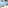 a boat on a beach with palm trees