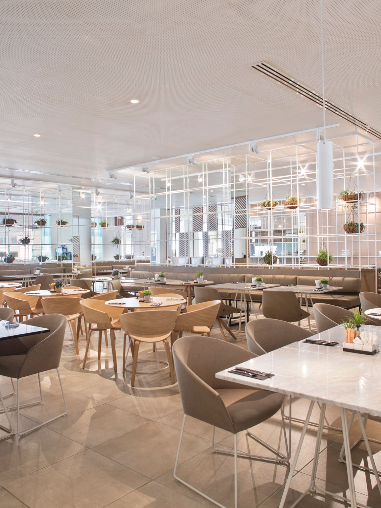 a large room with tables and chairs