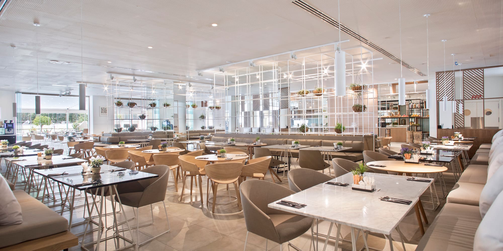 a large room with tables and chairs