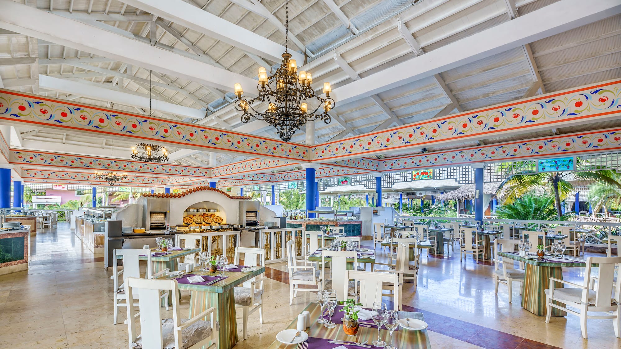 a restaurant with tables and chairs