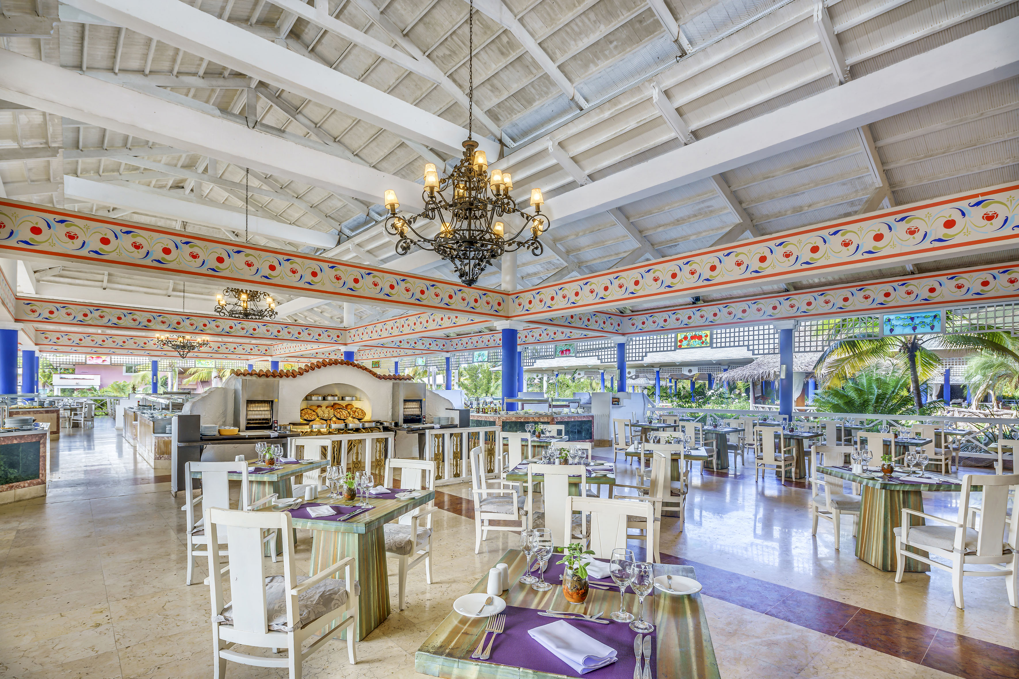 a restaurant with tables and chairs