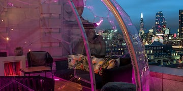 a glass dome with lights on it