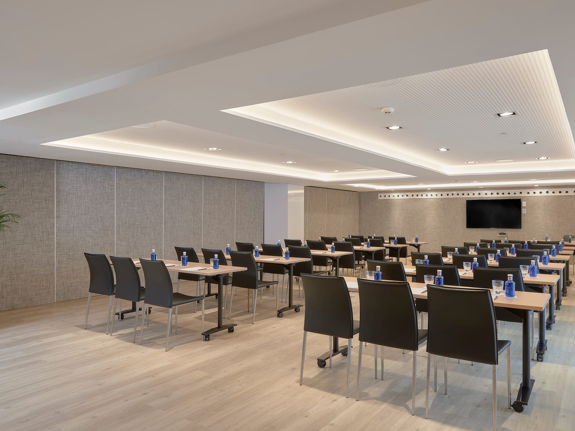 a room with tables and chairs