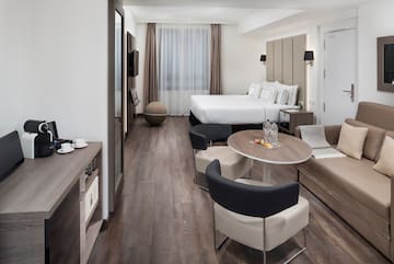 a room with a bed and a table