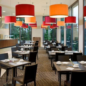 a restaurant with tables and chairs
