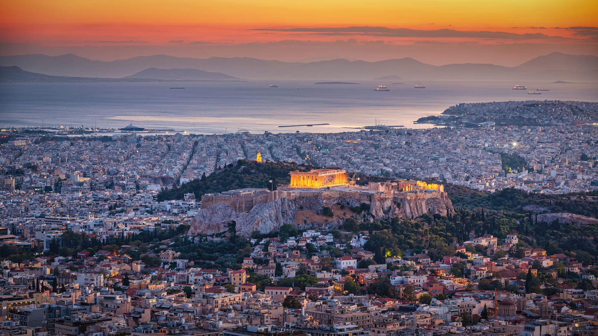 a city with a large building on top of it