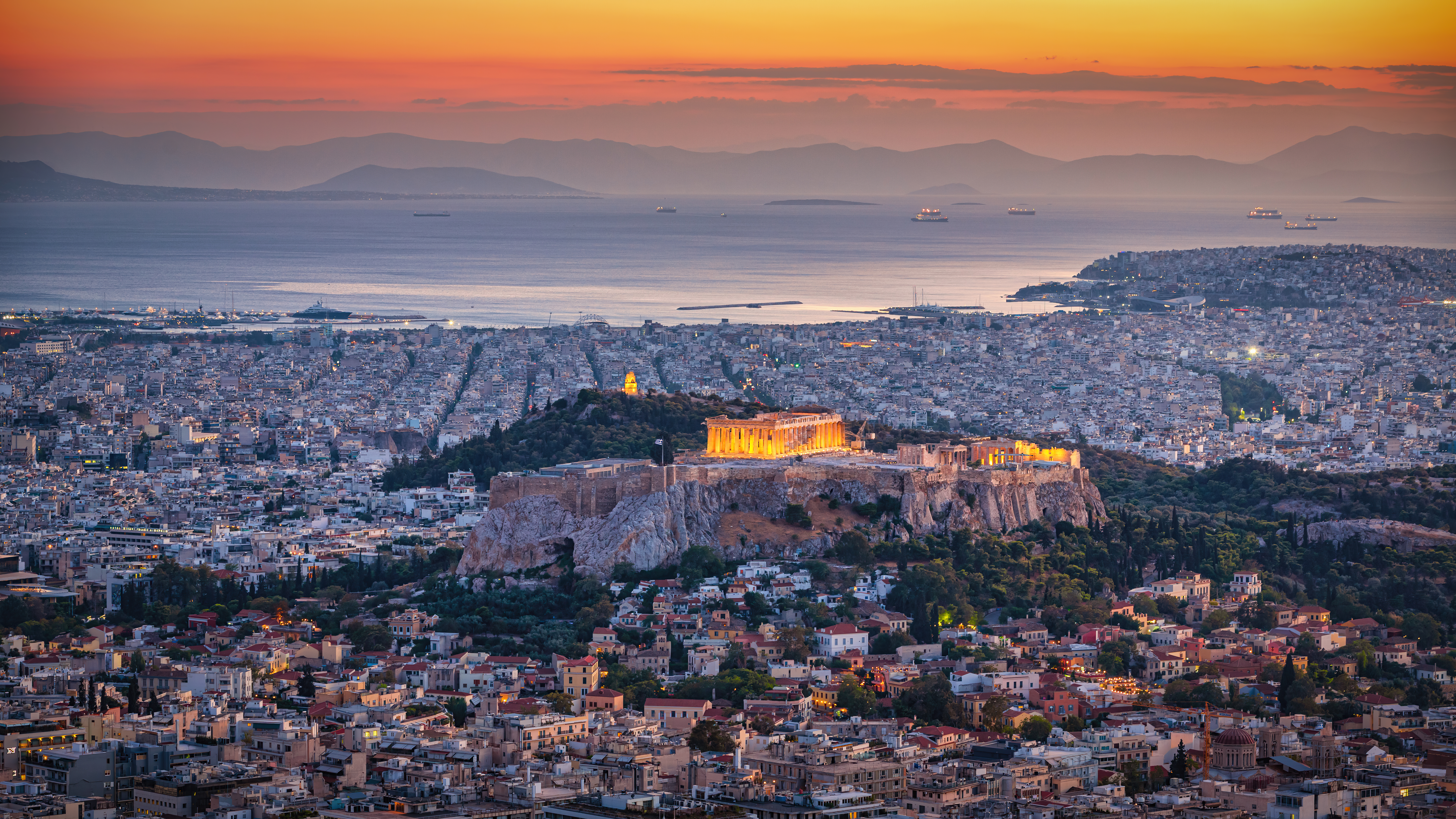 a city with a large building on top of it