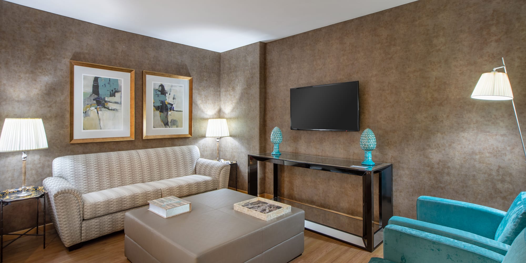 a living room with a tv and couch