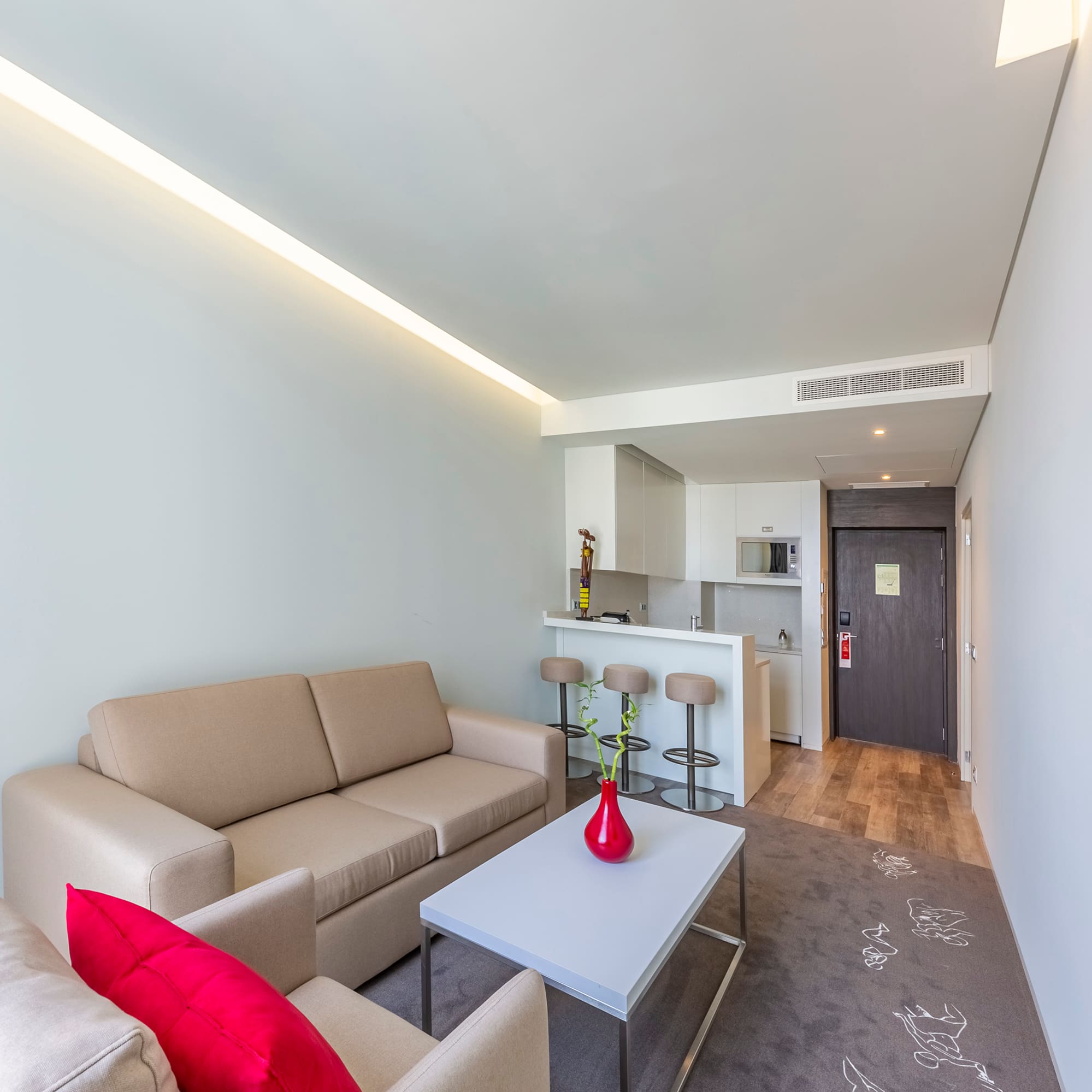 a living room with a couch and a table