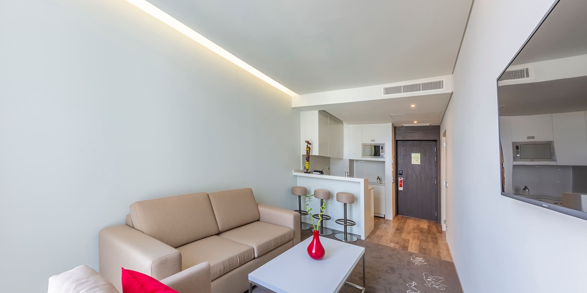 a living room with a couch and a table