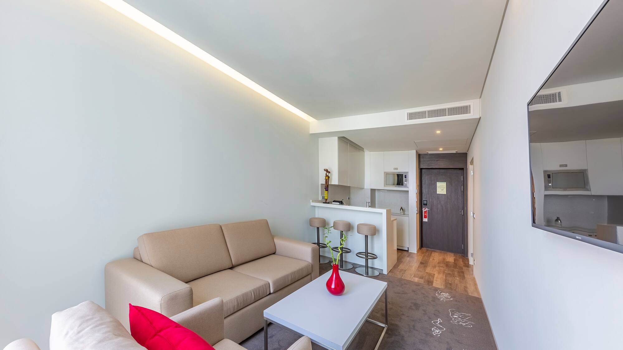 a living room with a couch and a table