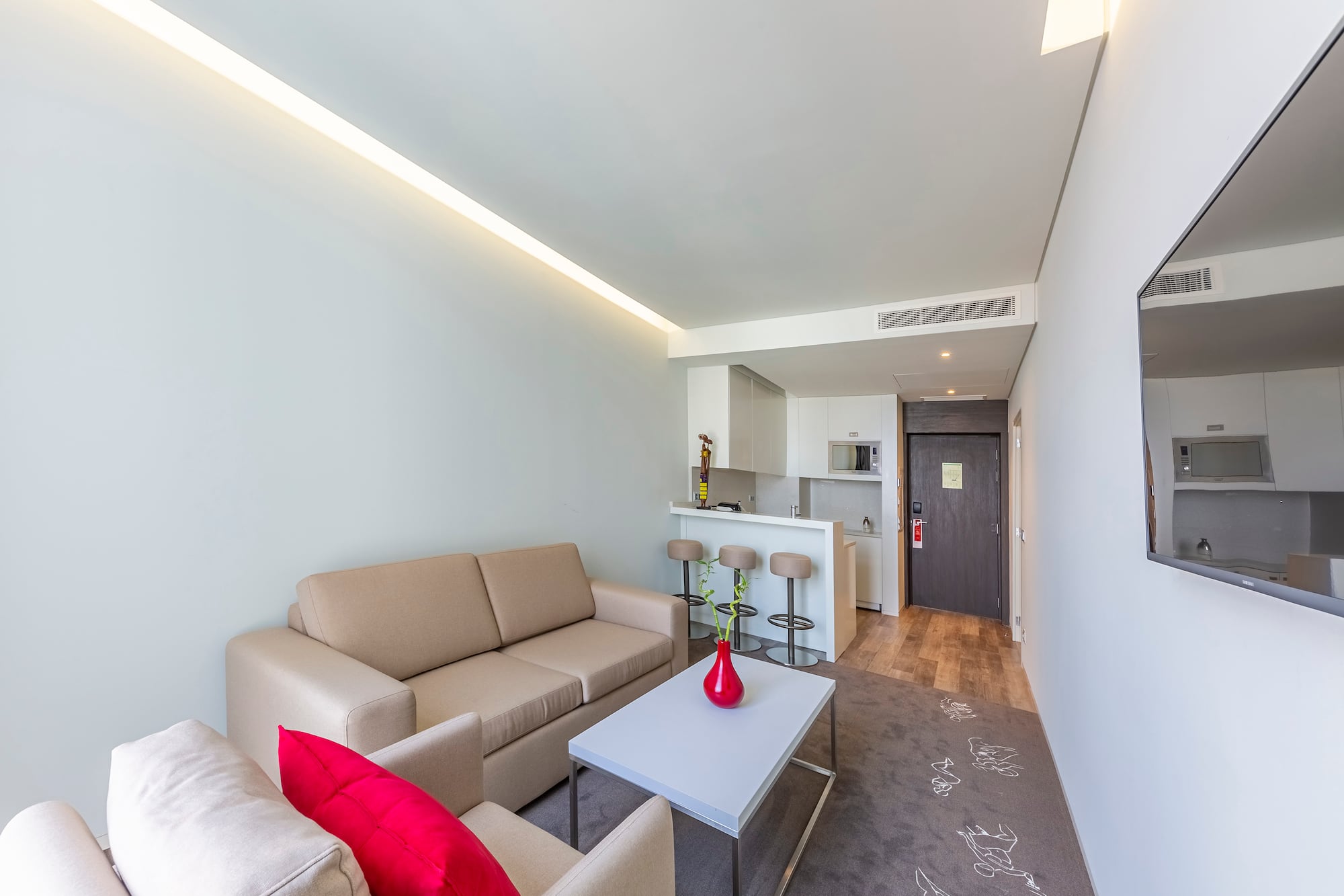 a living room with a couch and a table