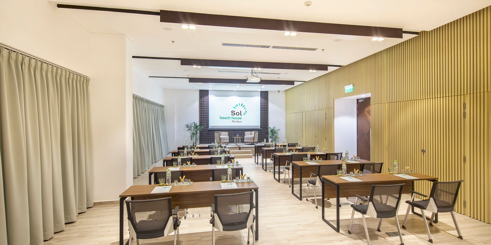 a room with tables and chairs