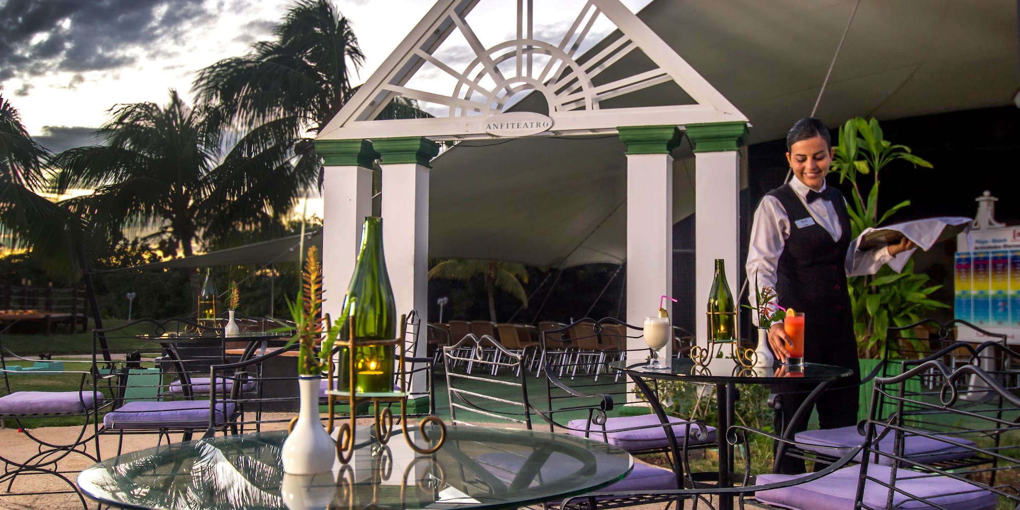 a woman standing at a table