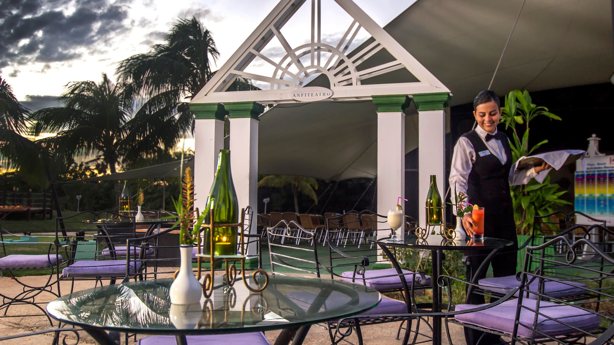 a woman standing at a table