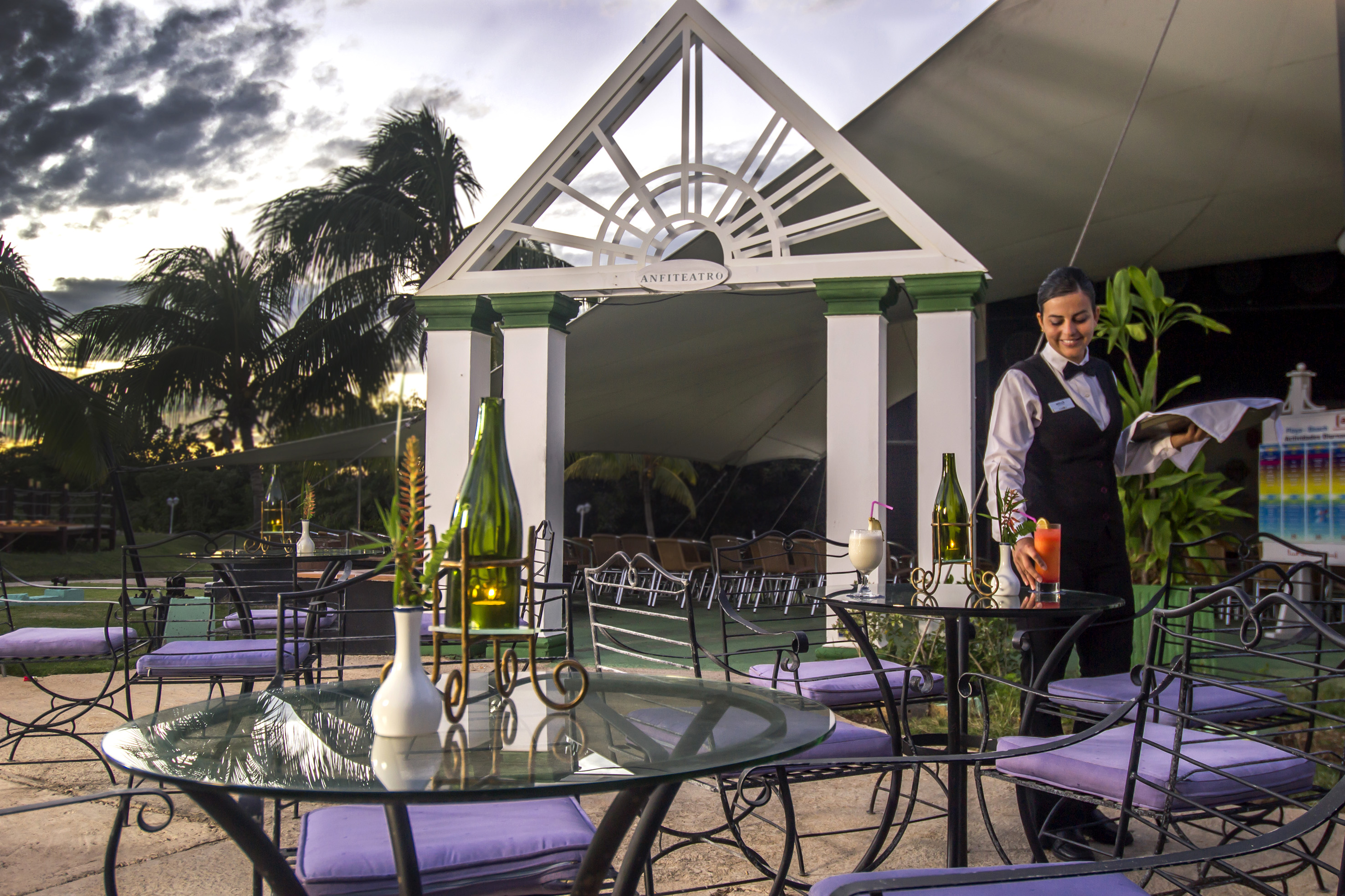 a woman standing at a table