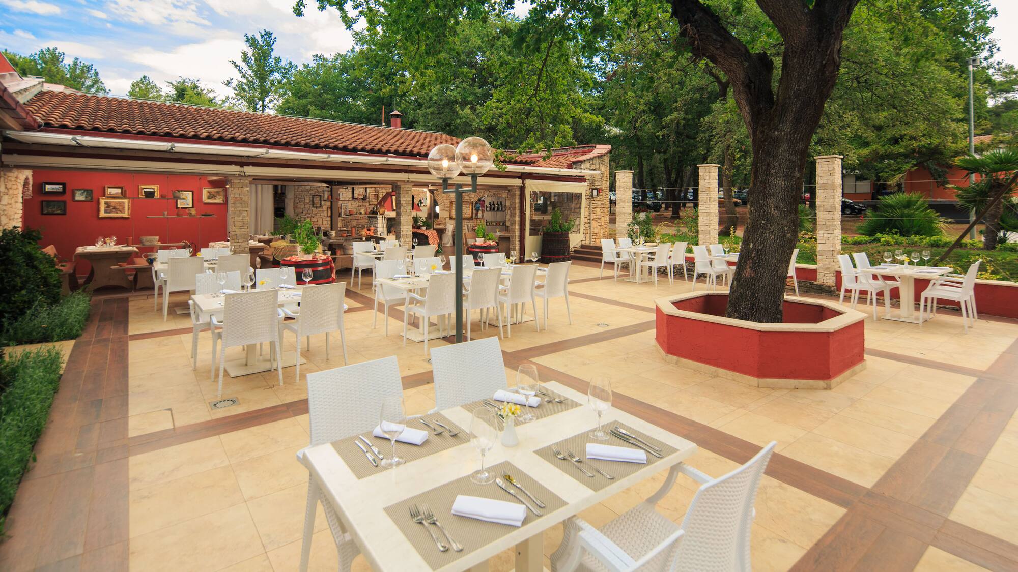a restaurant with tables and chairs